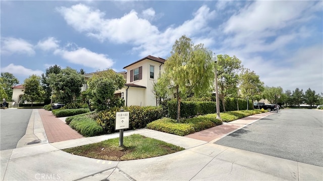 122 Espina, Irvine, CA 92620 - view of front of property featuring stucco siding
