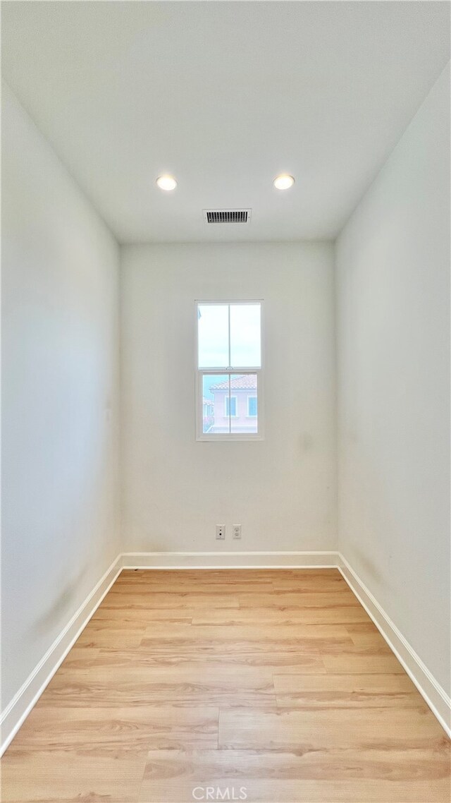 122 Espina, Irvine, CA 92620 - spare room with recessed lighting and light wood-style floors