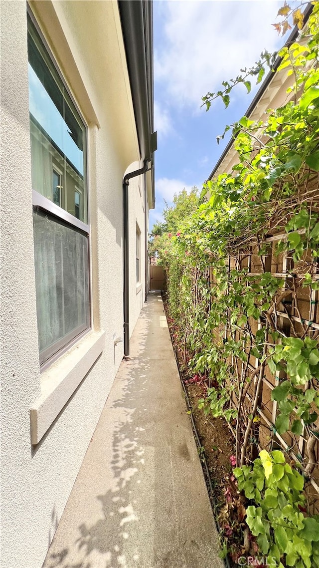 122 Espina, Irvine, CA 92620 - view of home's exterior featuring stucco siding