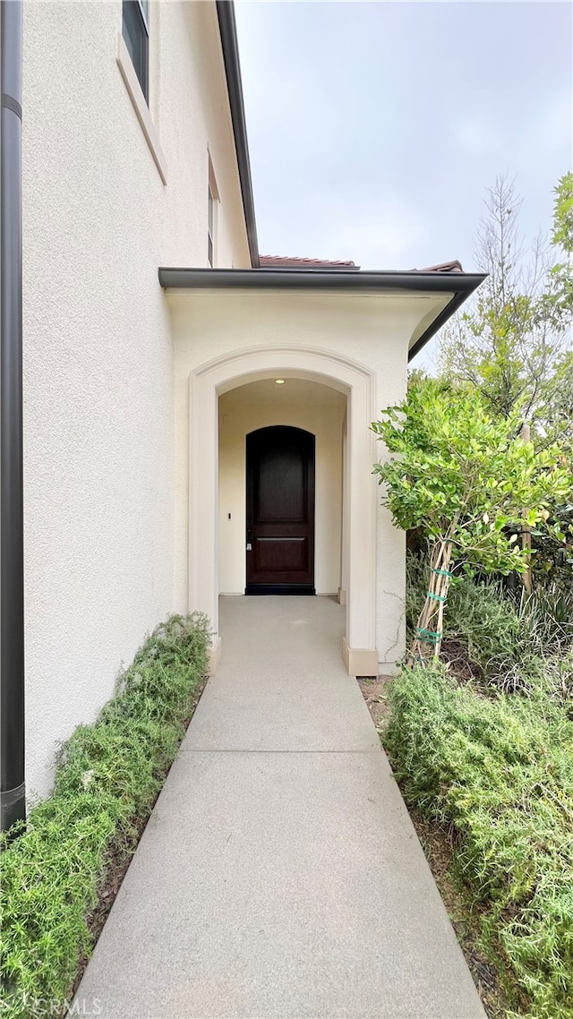 122 Espina, Irvine, CA 92620 - view of exterior entry with stucco siding