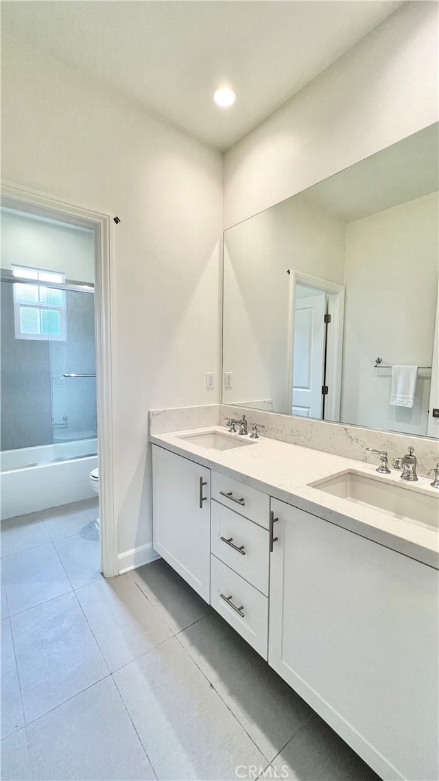122 Espina, Irvine, CA 92620 - bathroom with double vanity, tile patterned floors, and shower / bathtub combination