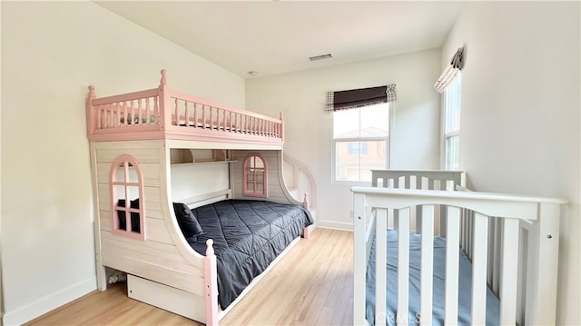 122 Espina, Irvine, CA 92620 - bedroom featuring wood finished floors and baseboards