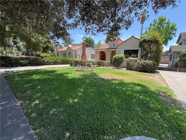 520 W Santa Clara Ave, Santa Ana, CA 92706 - mediterranean / spanish house with stucco siding and a tiled roof