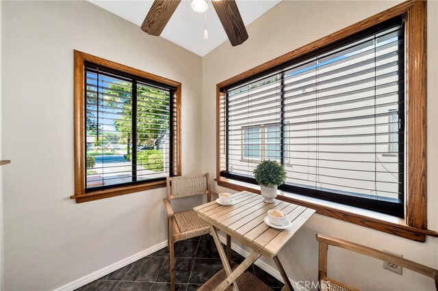 520 W Santa Clara Ave, Santa Ana, CA 92706 - dining room featuring ceiling fan and dark tile patterned flooring