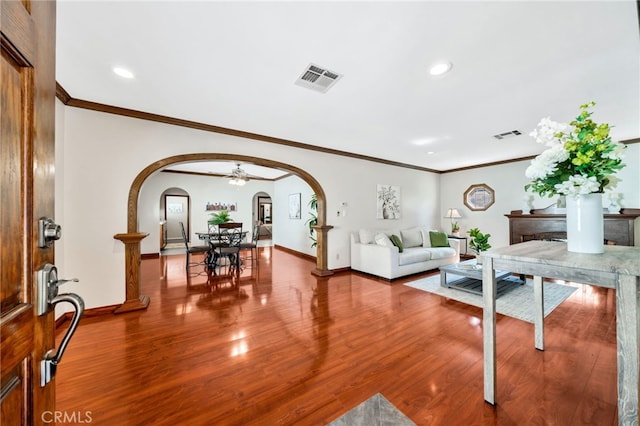 520 W Santa Clara Ave, Santa Ana, CA 92706 - living room featuring arched walkways, wood finished floors, recessed lighting, crown molding, and ceiling fan