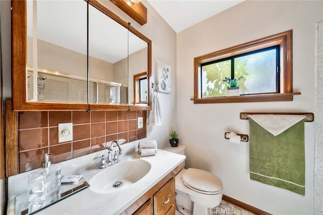 520 W Santa Clara Ave, Santa Ana, CA 92706 - bathroom featuring a shower with door, vanity, and tasteful backsplash