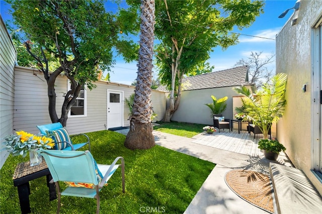 520 W Santa Clara Ave, Santa Ana, CA 92706 - view of green lawn with a deck