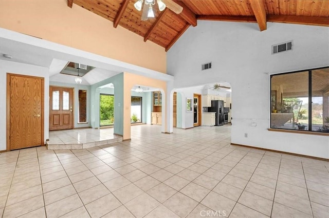 6710 Golden State Blvd, Madera, CA 93637 - foyer featuring ceiling fan, a wood ceiling with exposed beams, arched walkways, high vaulted ceiling, and light tile patterned flooring