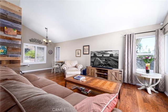 6255 Barranca Dr, Riverside, CA 92506 - living area with a chandelier, wood finished floors, healthy amount of natural light, and high vaulted ceiling