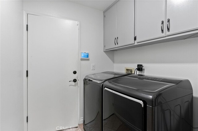 12026 Haven Crest St, Moorpark, CA 93021 - laundry room featuring washing machine and dryer and cabinet space