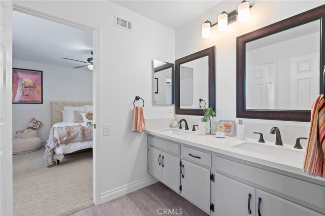 12026 Haven Crest St, Moorpark, CA 93021 - bathroom featuring double vanity, connected bathroom, and a ceiling fan