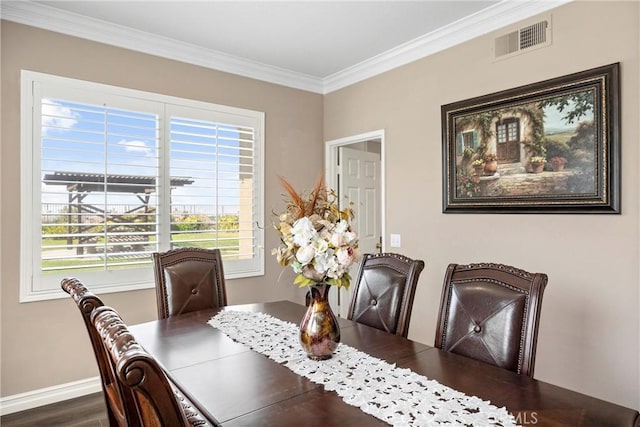 14181 Vai Brothers Dr, Rancho Cucamonga, CA 91739 - dining room featuring healthy amount of natural light, ornamental molding, and dark wood finished floors