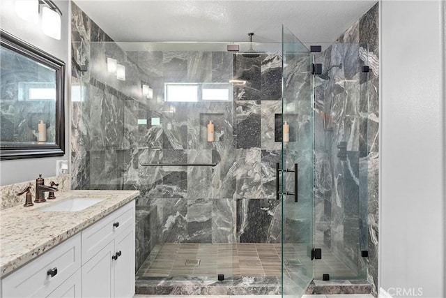 14181 Vai Brothers Dr, Rancho Cucamonga, CA 91739 - full bath featuring vanity and a marble finish shower