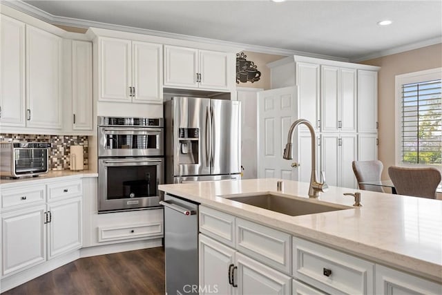 14181 Vai Brothers Dr, Rancho Cucamonga, CA 91739 - kitchen featuring appliances with stainless steel finishes, white cabinets, ornamental molding, recessed lighting, and dark wood-type flooring