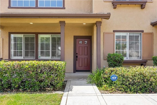 14181 Vai Brothers Dr, Rancho Cucamonga, CA 91739 - doorway to property featuring stucco siding and a porch