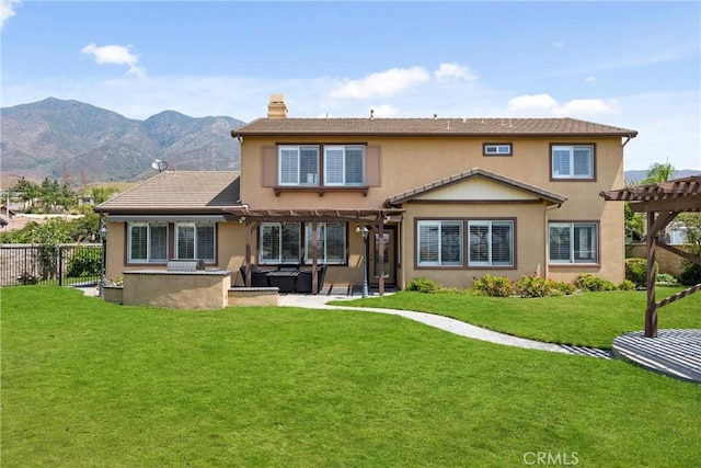 14181 Vai Brothers Dr, Rancho Cucamonga, CA 91739 - rear view of property featuring a pergola, stucco siding, a patio area, and a mountain view