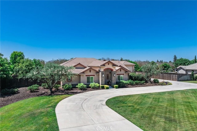 13611 Francisco Dr, Hanford, CA 93230 - view of front of property featuring stucco siding and a tile roof