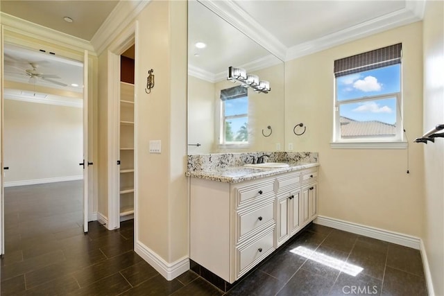 13611 Francisco Dr, Hanford, CA 93230 - full bathroom featuring vanity, a spacious closet, ceiling fan, and crown molding