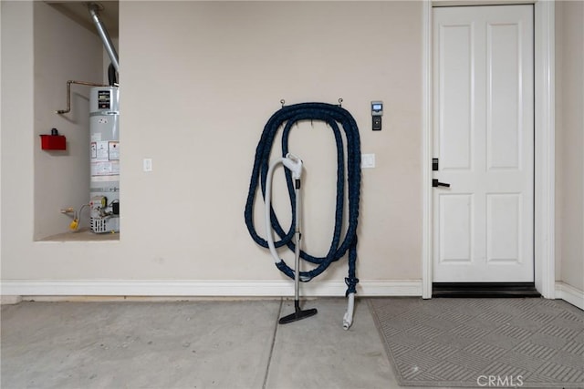 13611 Francisco Dr, Hanford, CA 93230 - foyer with concrete floors and water heater