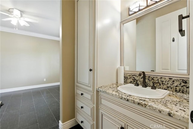 13611 Francisco Dr, Hanford, CA 93230 - bathroom featuring vanity, crown molding, a ceiling fan, and tile patterned flooring