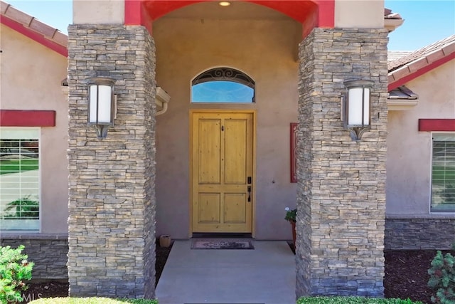13611 Francisco Dr, Hanford, CA 93230 - view of exterior entry featuring stucco siding and stone siding
