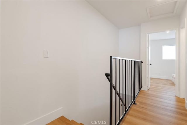 525 E Verdugo Ave Unit E, Burbank, CA 91501 - hall featuring an upstairs landing, light wood finished floors, and attic access