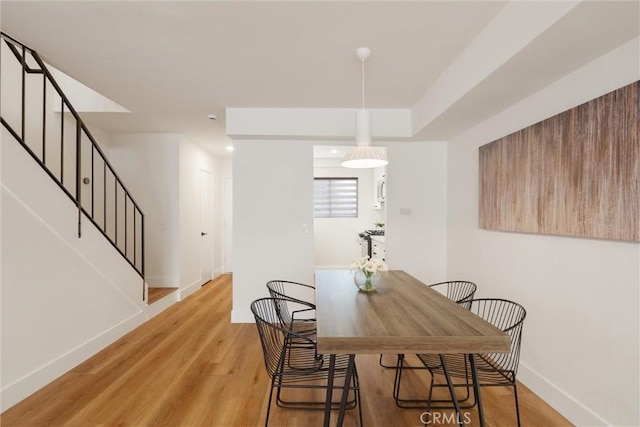 525 E Verdugo Ave Unit E, Burbank, CA 91501 - dining area with stairs and light wood finished floors