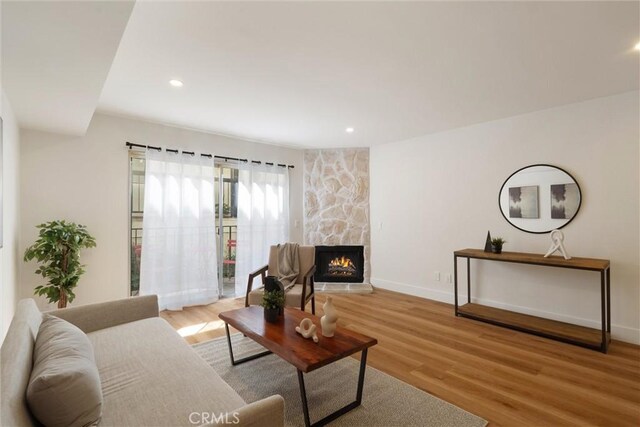 525 E Verdugo Ave Unit E, Burbank, CA 91501 - living area featuring light wood-style floors, a fireplace, and recessed lighting
