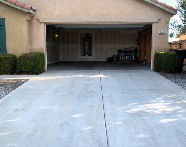 16558 Jasmine St, Victorville, CA 92395 - garage featuring concrete driveway