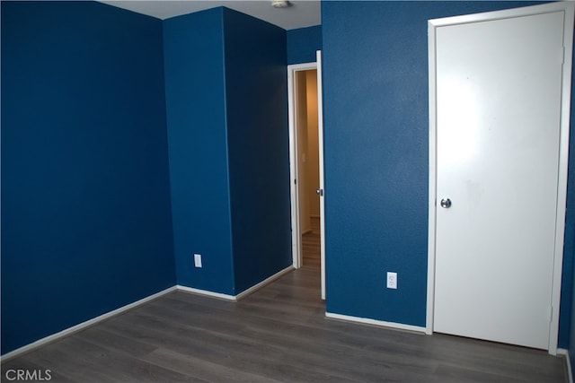16558 Jasmine St, Victorville, CA 92395 - unfurnished bedroom featuring wood finished floors