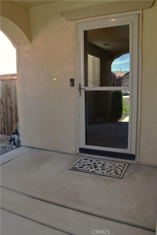 16558 Jasmine St, Victorville, CA 92395 - property entrance featuring stucco siding