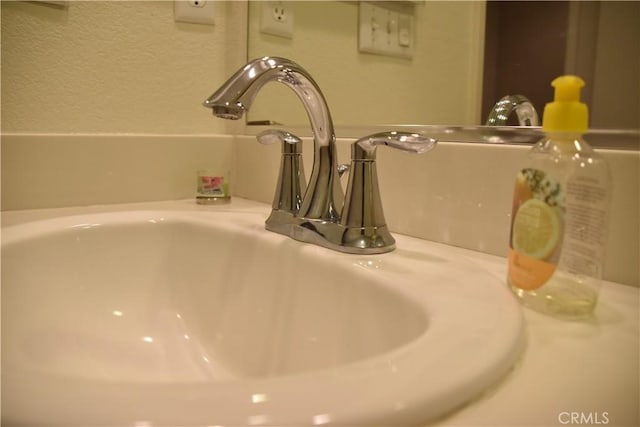 16558 Jasmine St, Victorville, CA 92395 - bathroom view of a sink and a textured wall