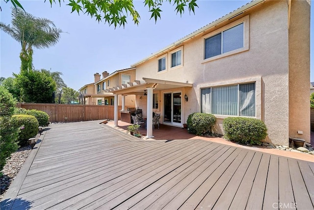 11853 Saybrook Dr, Rancho Cucamonga, CA 91730 - deck featuring a fenced backyard and exterior kitchen