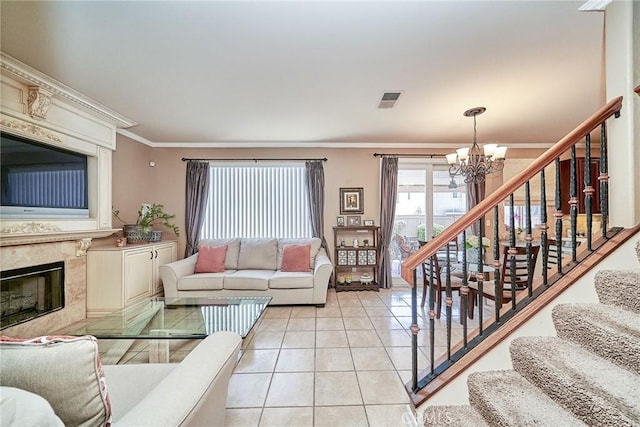 11853 Saybrook Dr, Rancho Cucamonga, CA 91730 - living room with a chandelier, stairs, light tile patterned floors, ornamental molding, and a high end fireplace