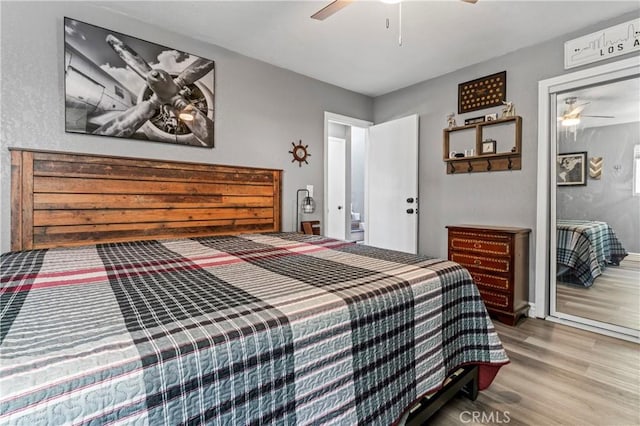 32538 Scandia Dr, Running Springs, CA 92382 - bedroom with wood finished floors and a ceiling fan