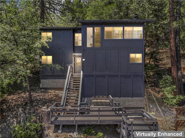 32538 Scandia Dr, Running Springs, CA 92382 - view of front facade featuring board and batten siding, stairs, and an outbuilding