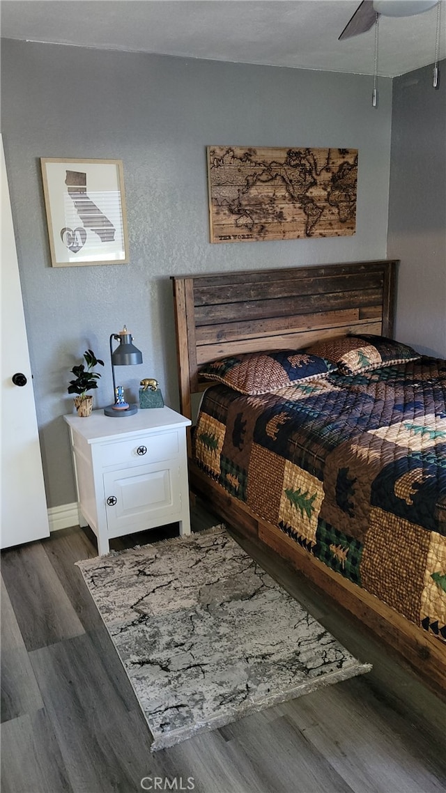 32538 Scandia Dr, Running Springs, CA 92382 - bedroom with dark wood finished floors and baseboards