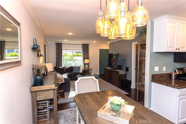 2414 Niagara Way, Costa Mesa, CA 92626 - dining space featuring a chandelier, crown molding, wood finished floors, and recessed lighting