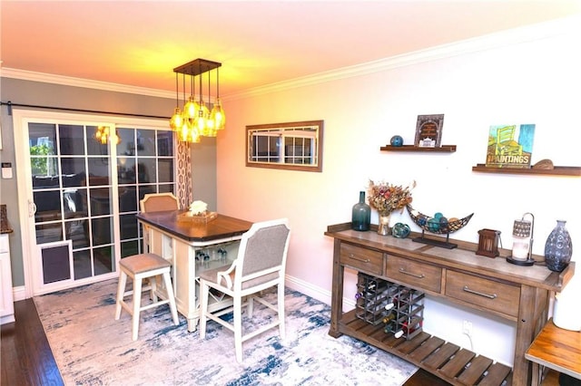 2414 Niagara Way, Costa Mesa, CA 92626 - dining area featuring crown molding, wood finished floors, and a chandelier