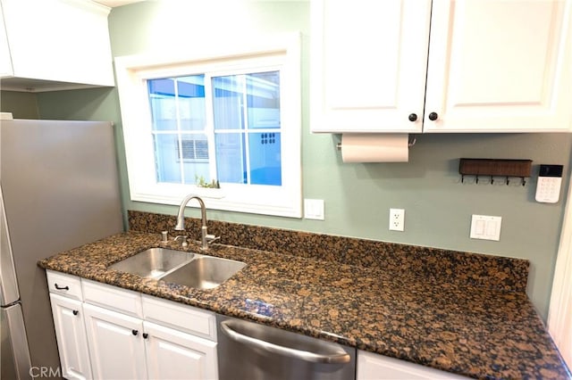 2414 Niagara Way, Costa Mesa, CA 92626 - kitchen with stainless steel appliances, white cabinets, and dark stone counters