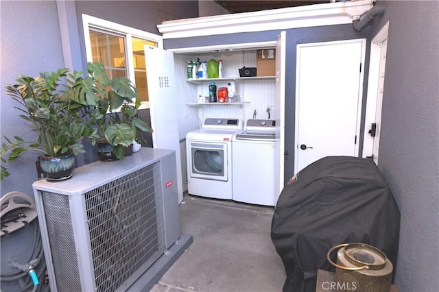 2414 Niagara Way, Costa Mesa, CA 92626 - laundry room with washer and clothes dryer and a textured wall
