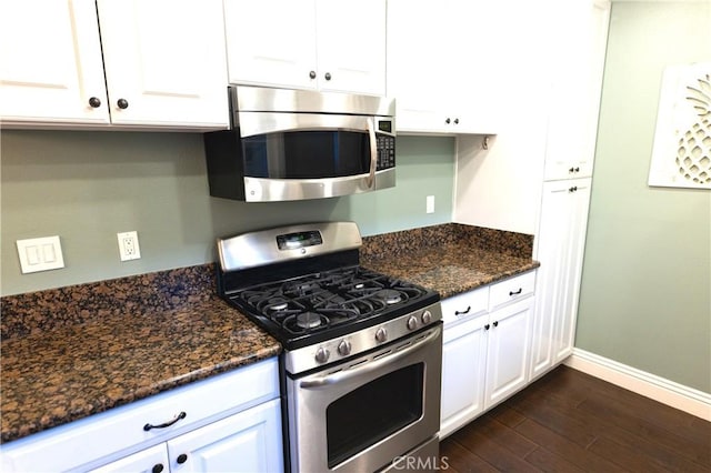 2414 Niagara Way, Costa Mesa, CA 92626 - kitchen featuring appliances with stainless steel finishes, dark wood-style flooring, and white cabinets