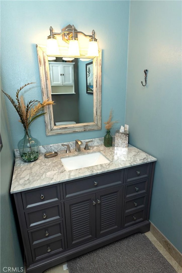2414 Niagara Way, Costa Mesa, CA 92626 - bathroom featuring vanity and baseboards
