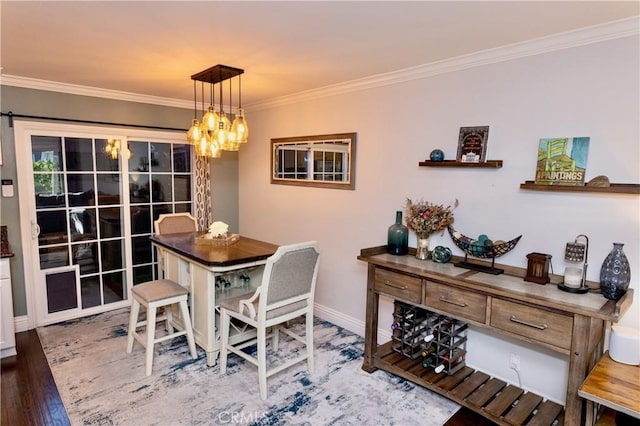 2414 Niagara Way, Costa Mesa, CA 92626 - dining room featuring ornamental molding, wood finished floors, and a chandelier