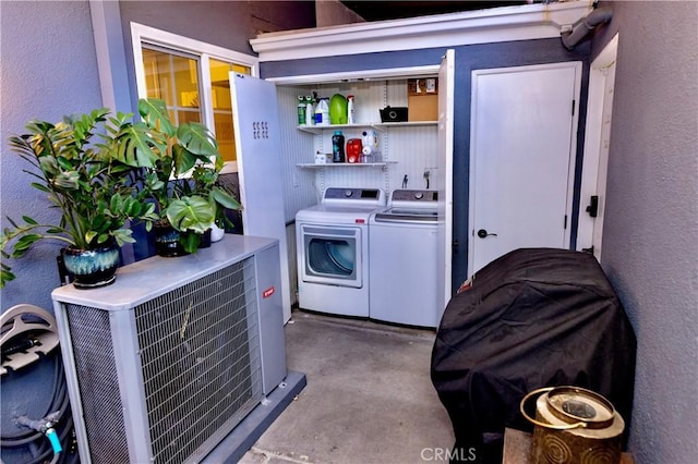2414 Niagara Way, Costa Mesa, CA 92626 - laundry room with independent washer and dryer and a textured wall