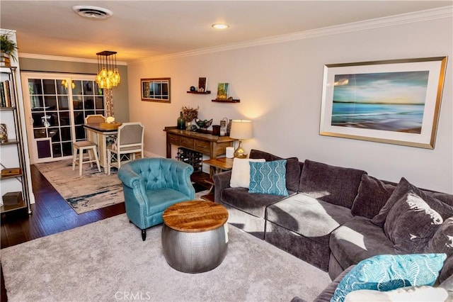 2414 Niagara Way, Costa Mesa, CA 92626 - living room with wood finished floors, crown molding, and a chandelier