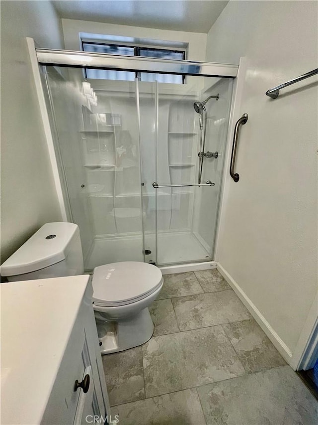 13842 Olive St, Baldwin Park, CA 91706 - bathroom with a shower stall, vanity, and stone finish floors