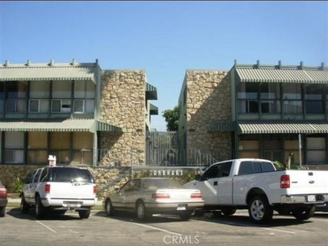 438 Cedar Ave Unit 6, Long Beach, CA 90802 - view of building exterior with uncovered parking