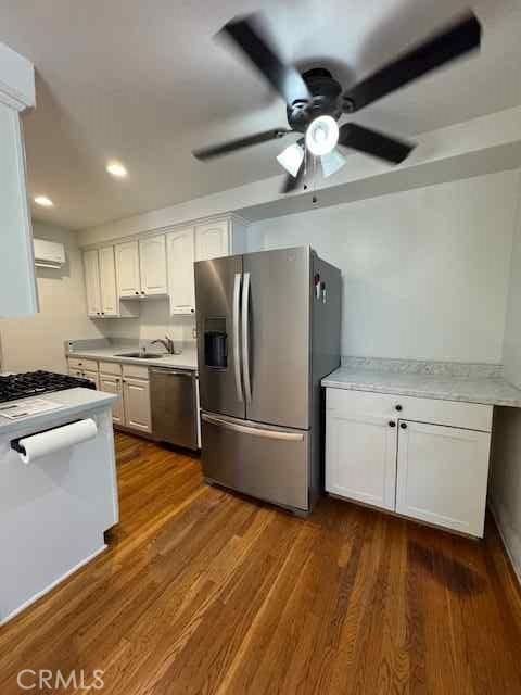 438 Cedar Ave Unit 6, Long Beach, CA 90802 - kitchen featuring appliances with stainless steel finishes, ceiling fan, light countertops, white cabinetry, and recessed lighting