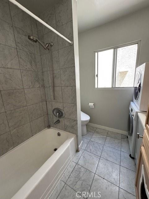 438 Cedar Ave Unit 6, Long Beach, CA 90802 - full bath featuring stacked washer and clothes dryer, vanity, marble finish floors, and  shower combination